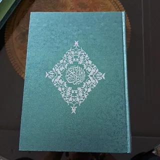 قرآن کاغذ گلاسه