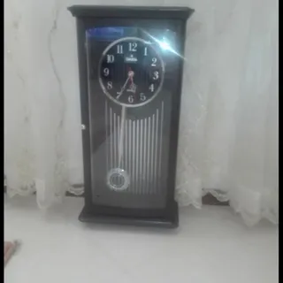 ساعت دیواری پاندول دار