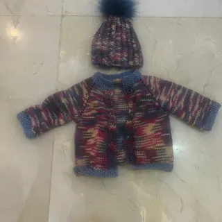 لباس بافتنی نوزادی با کلا