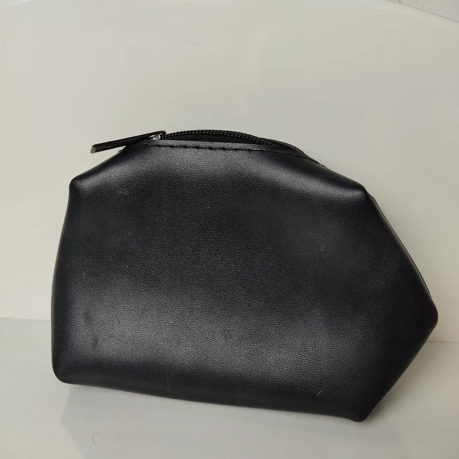 کیف آرایش کوچک چرم