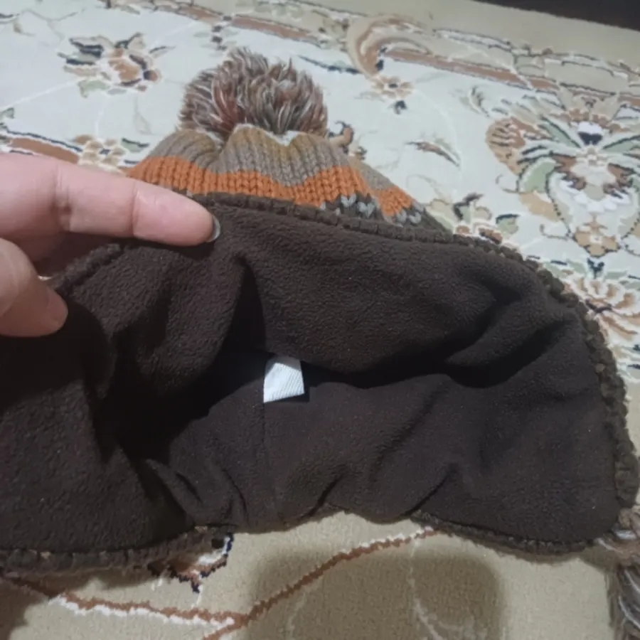 کلاه داخل پشم درحدنو