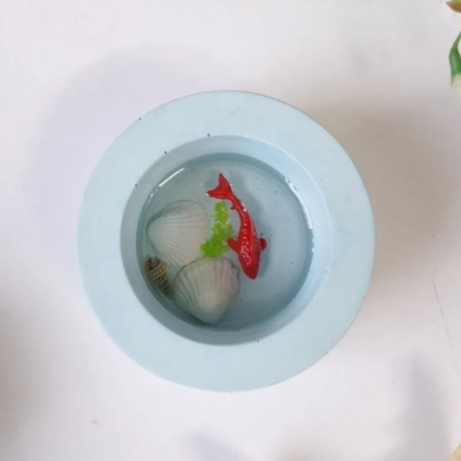تنگ ماهی با ظرف سنگی