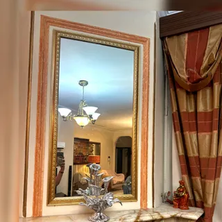 قاب آینه دور چوبی طلایی