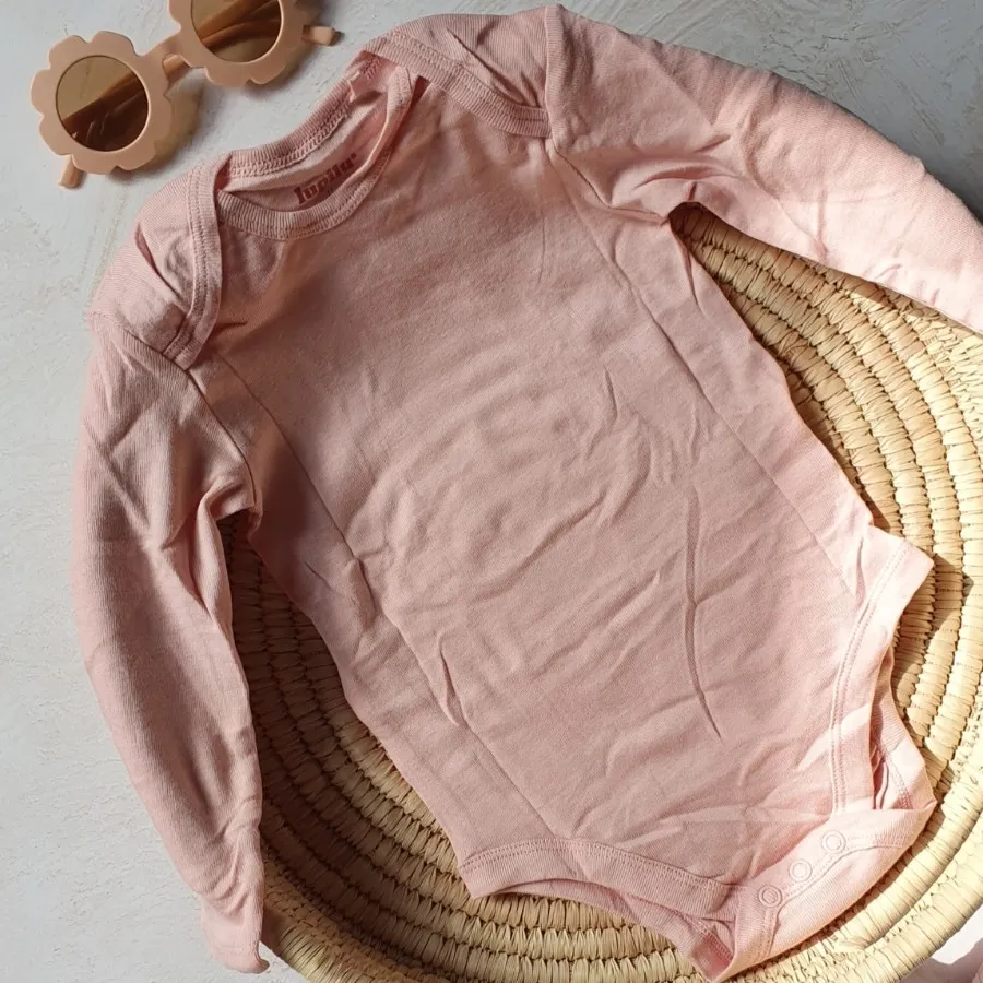 بادی نوزادی زیر دکمه ای