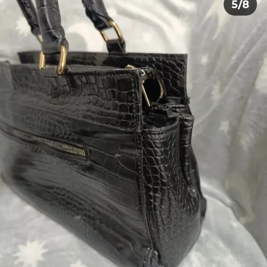 کیف چرم پوست ماری