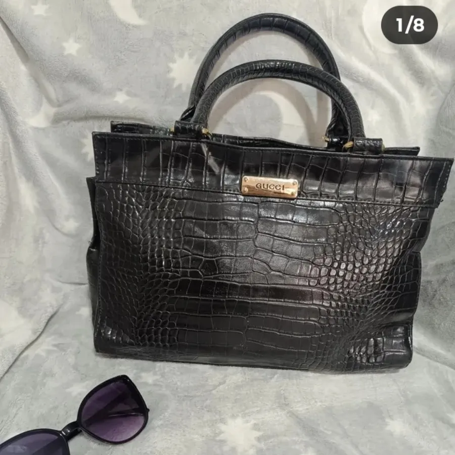 کیف چرم پوست ماری