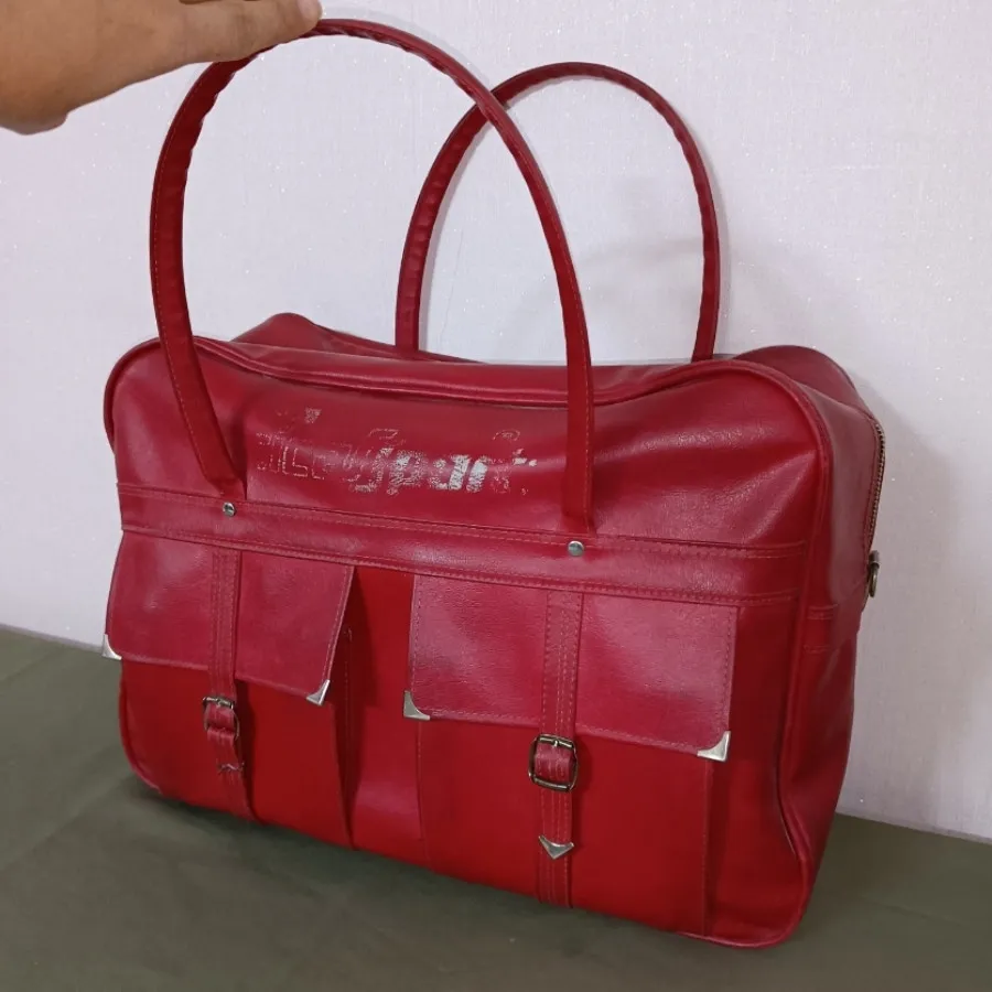 ساک چرم مسافرتی
