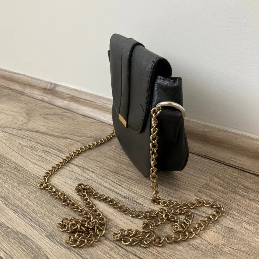 کیف مشکی defacto