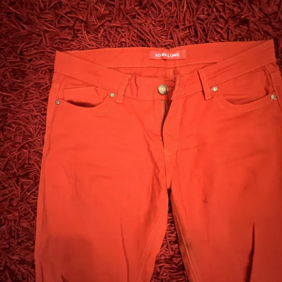 شلوار 80 نارنجی  برند