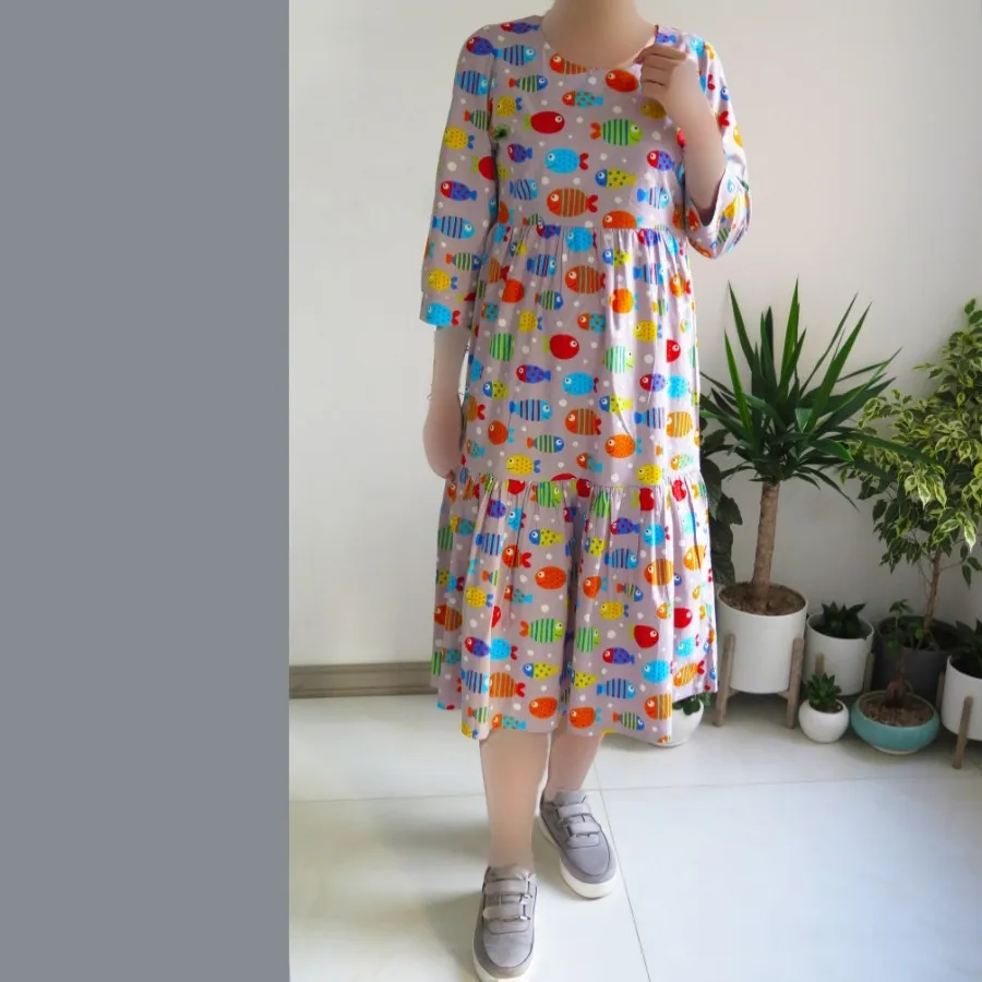 پیراهن نخی همراه با تل سر