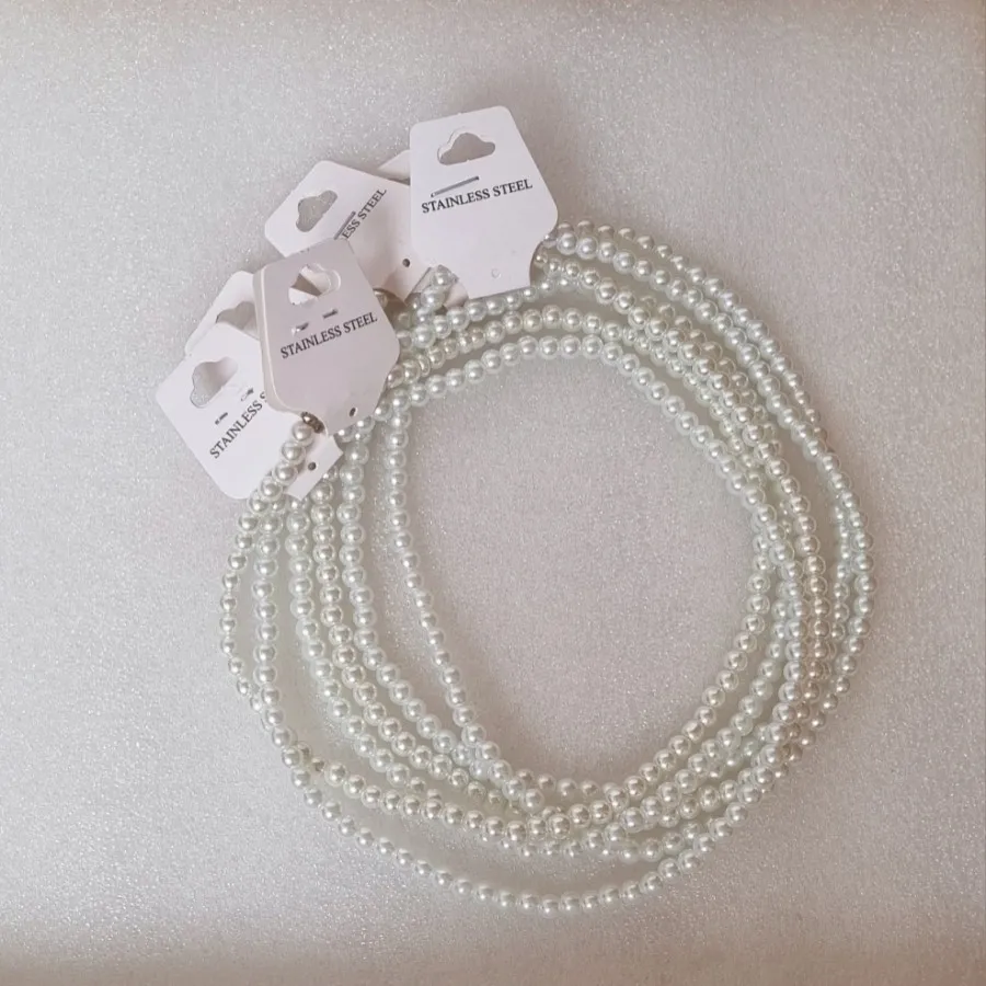 گردنبند مرواریدی و ماری