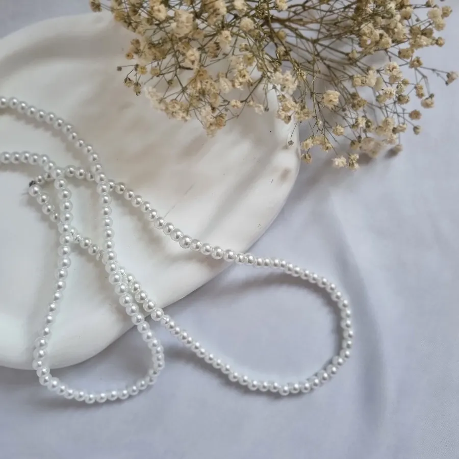 گردنبند مرواریدی و ماری