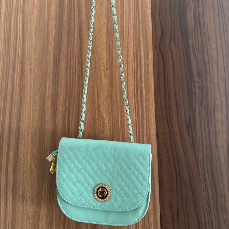 کیف بند بلند سبز آبی رنگ