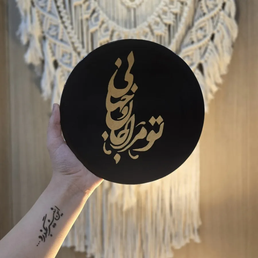 دیوارکوب سفالی مشکی طلایی