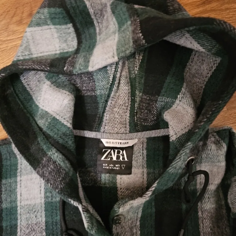 ژاکت پشمی کلاه دار