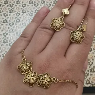 نیم ست طلایی گل گلی زنجیر