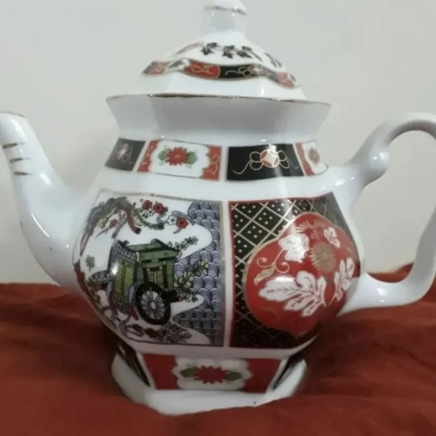 قوری کالسکه ای