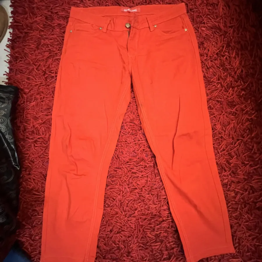 شلوار 80 نارنجی  برند