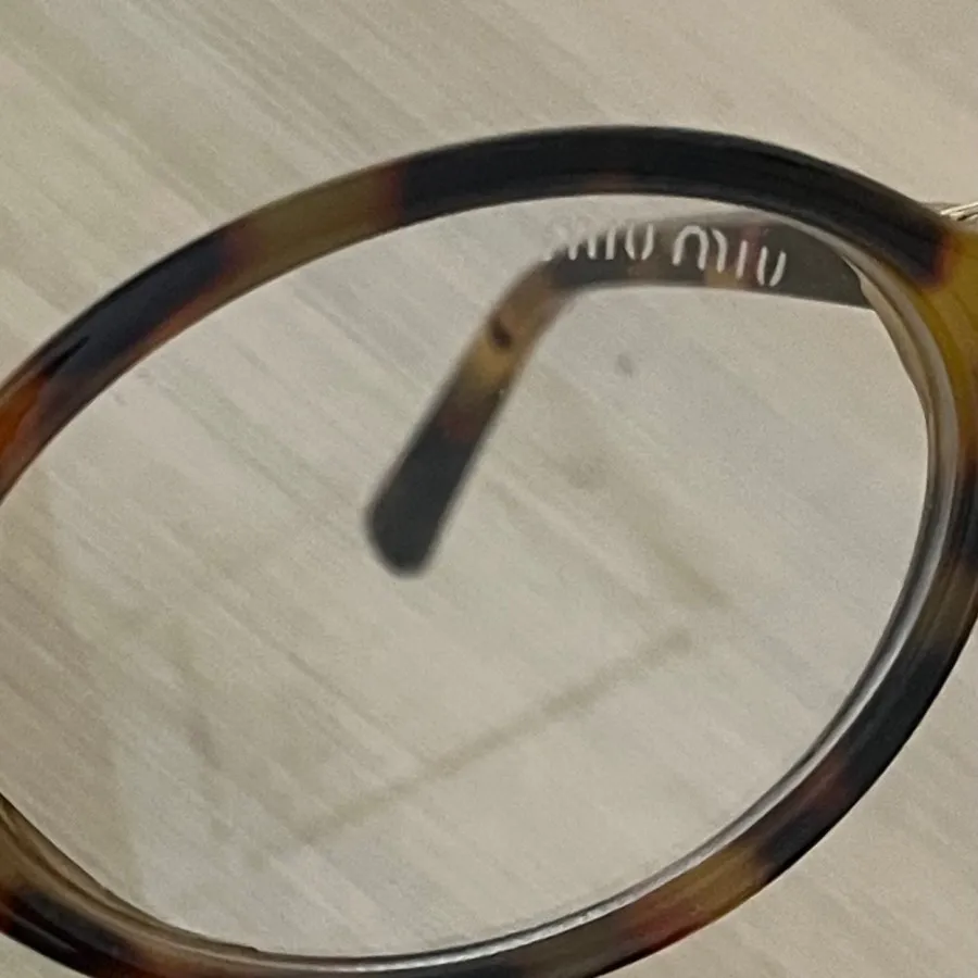 عینک پلنگی میو میو