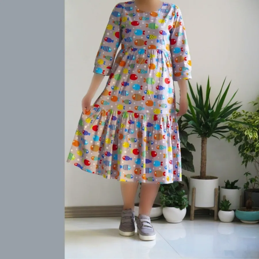 پیراهن نخی همراه با تل سر