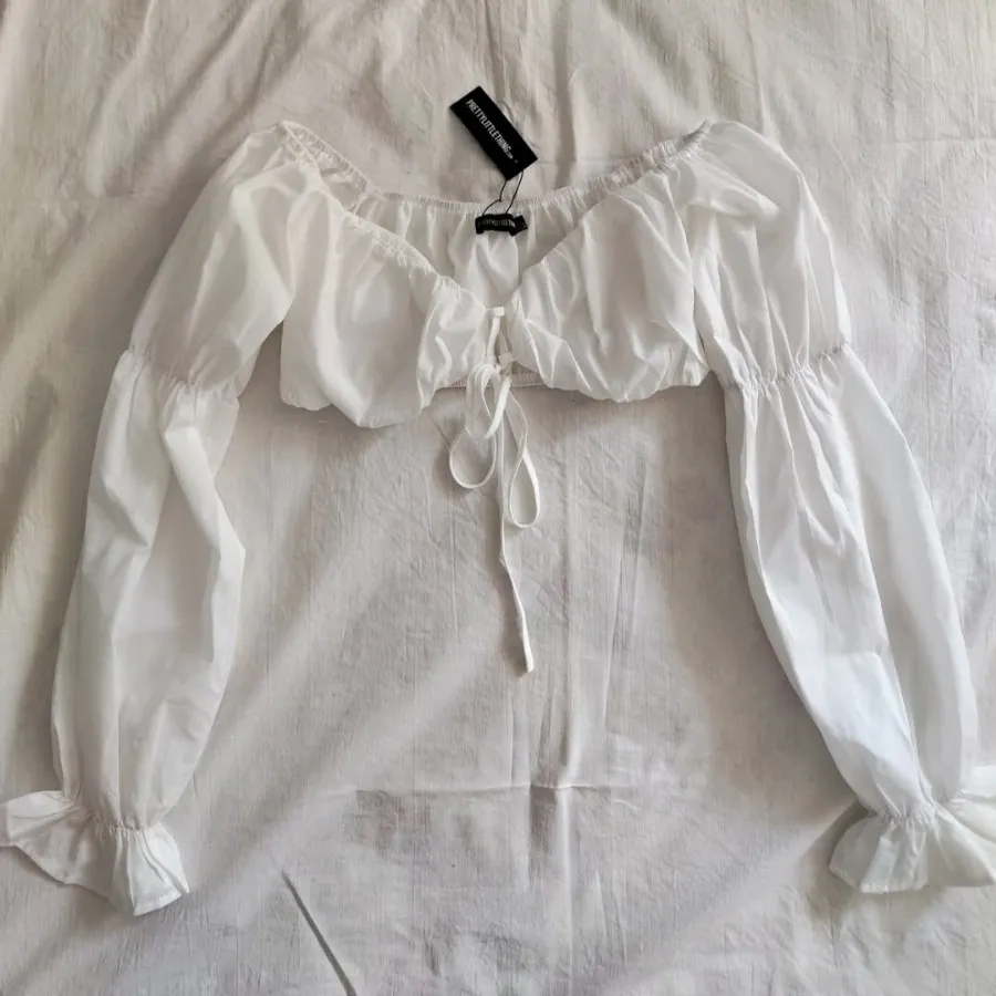 نیم تنه آستین بلند سفید