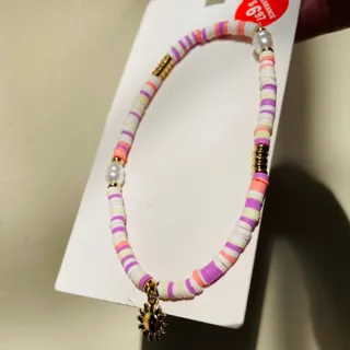 پابند مهره های رنگی