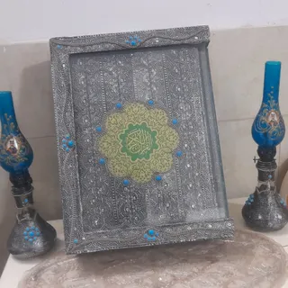 قرآن و چراغ گر سوز