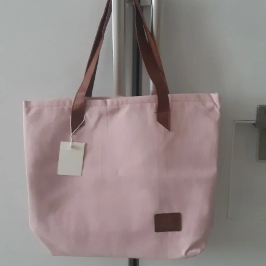 کیف صورتی کمرنگ