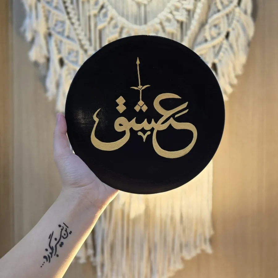 دیوارکوب سفالی مشکی طلایی