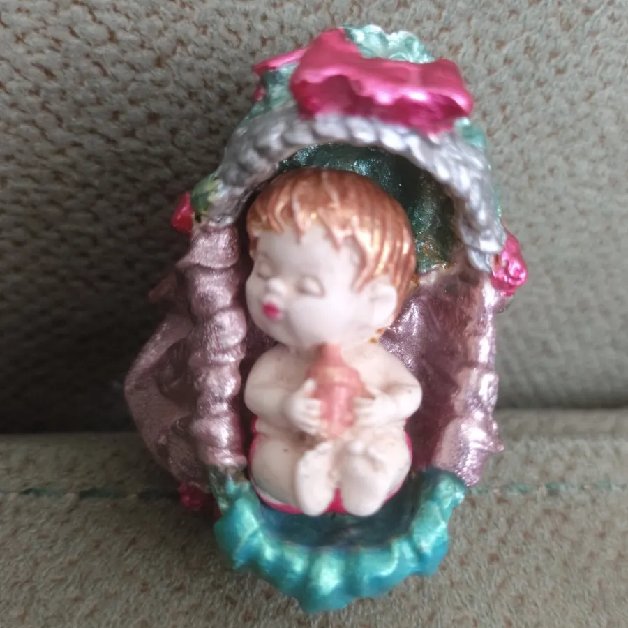 مجسمه  سنگی گهواره