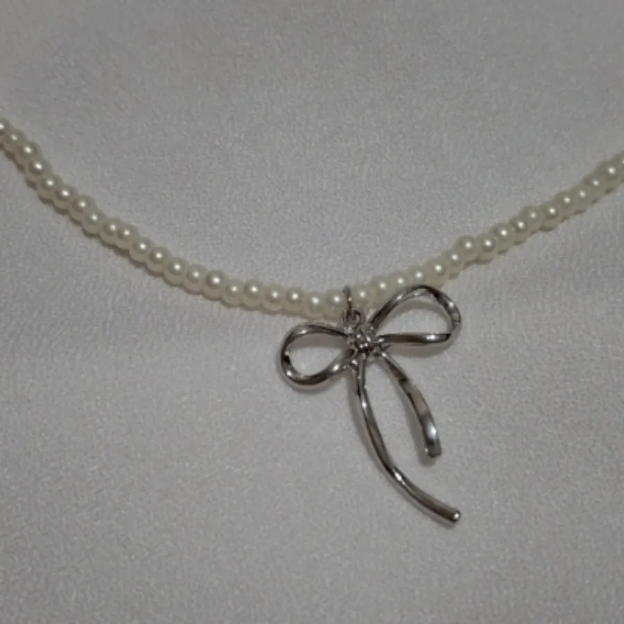 ست گردنبند،گوشواره پاپیون