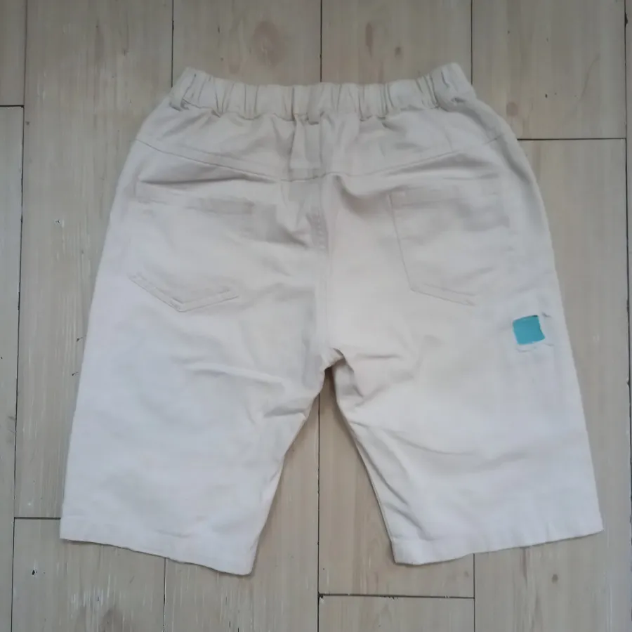 شلوارک سفید زاپ دار