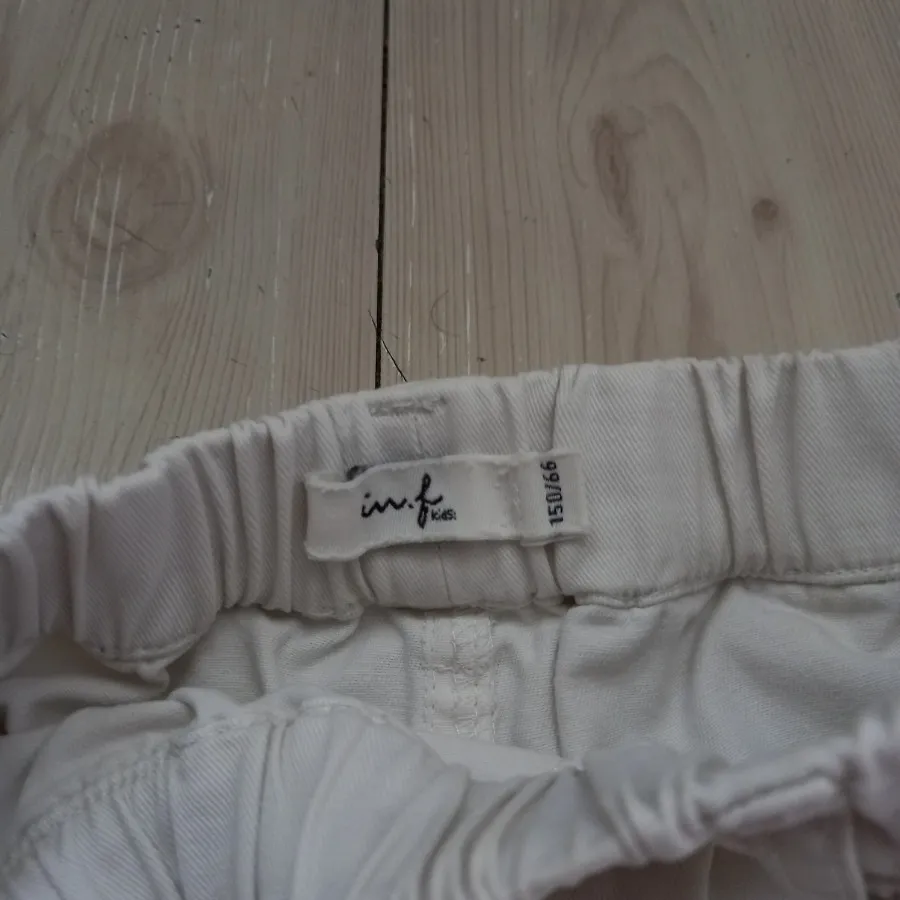 شلوارک سفید زاپ دار