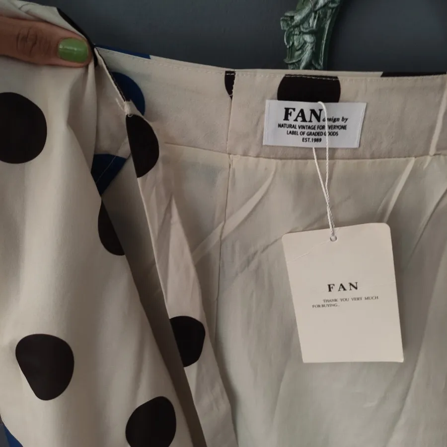 دامن ساتن خال خالی FAN