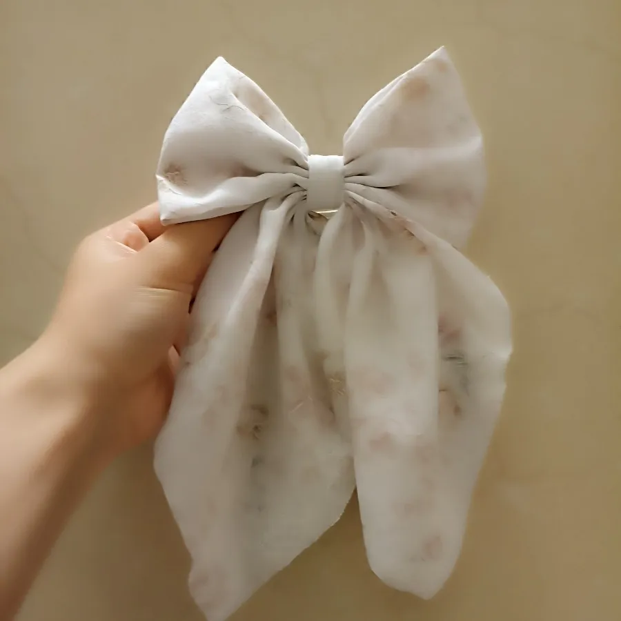 گیره پاپیونی دنباله دار