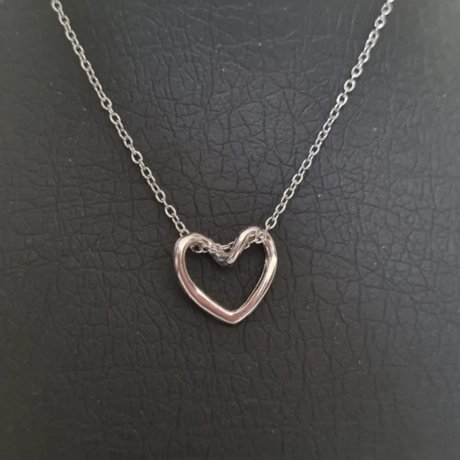 پلاک زنجیر قلب دفرمه