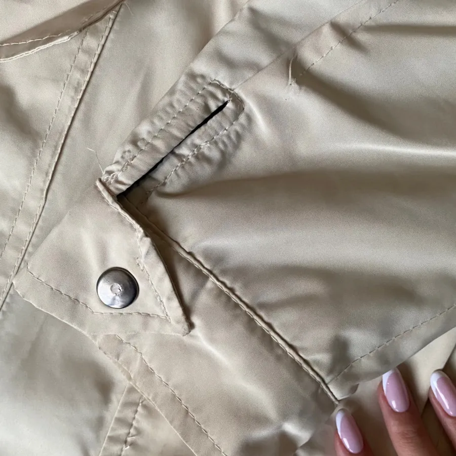 کاپشن شیری رنگ