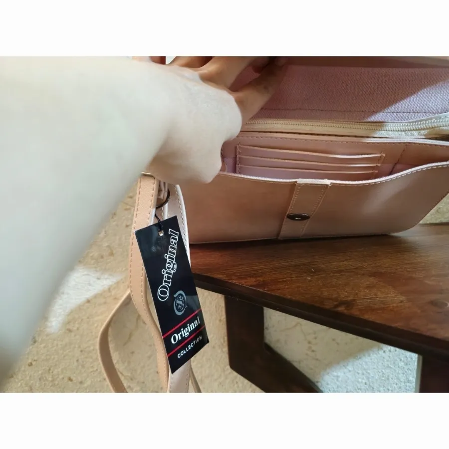 کیف صورتی صدفی