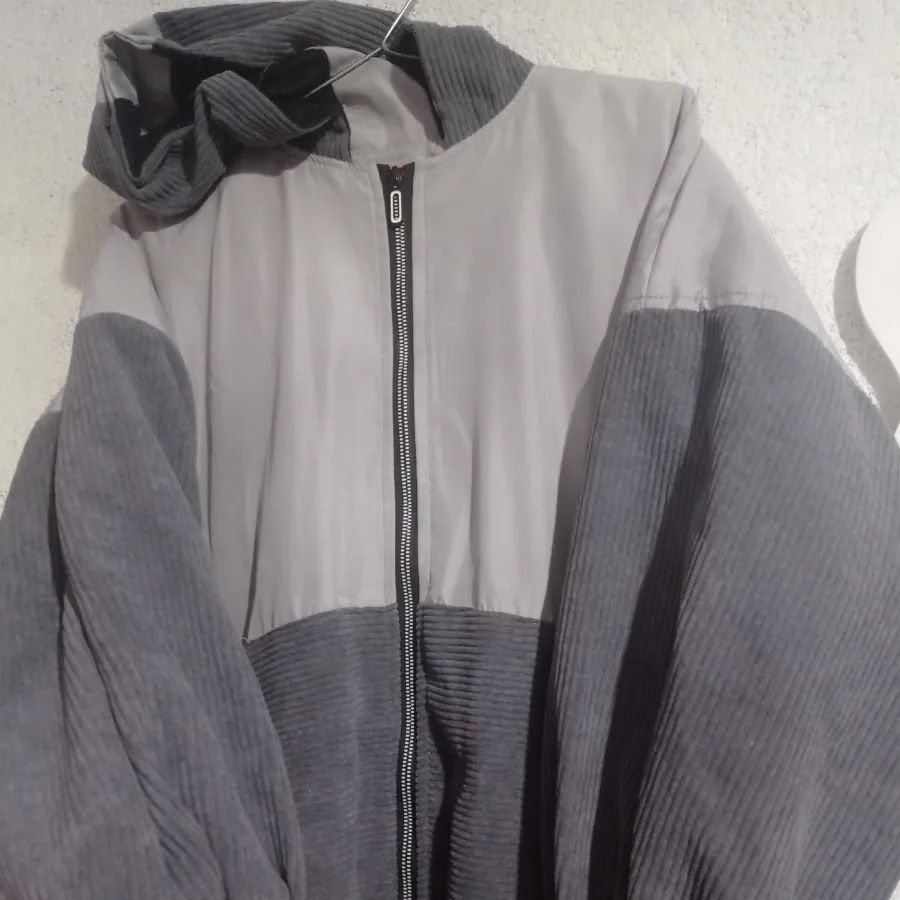 کاپشن بلند طوسی