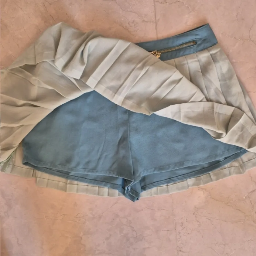 شلوارک طرح دامن پلیسه