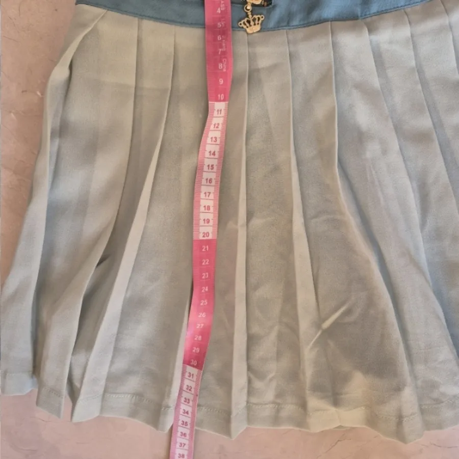 شلوارک طرح دامن پلیسه