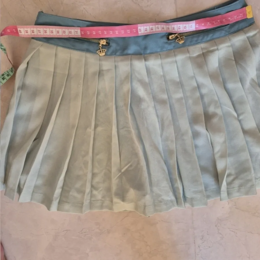 شلوارک طرح دامن پلیسه