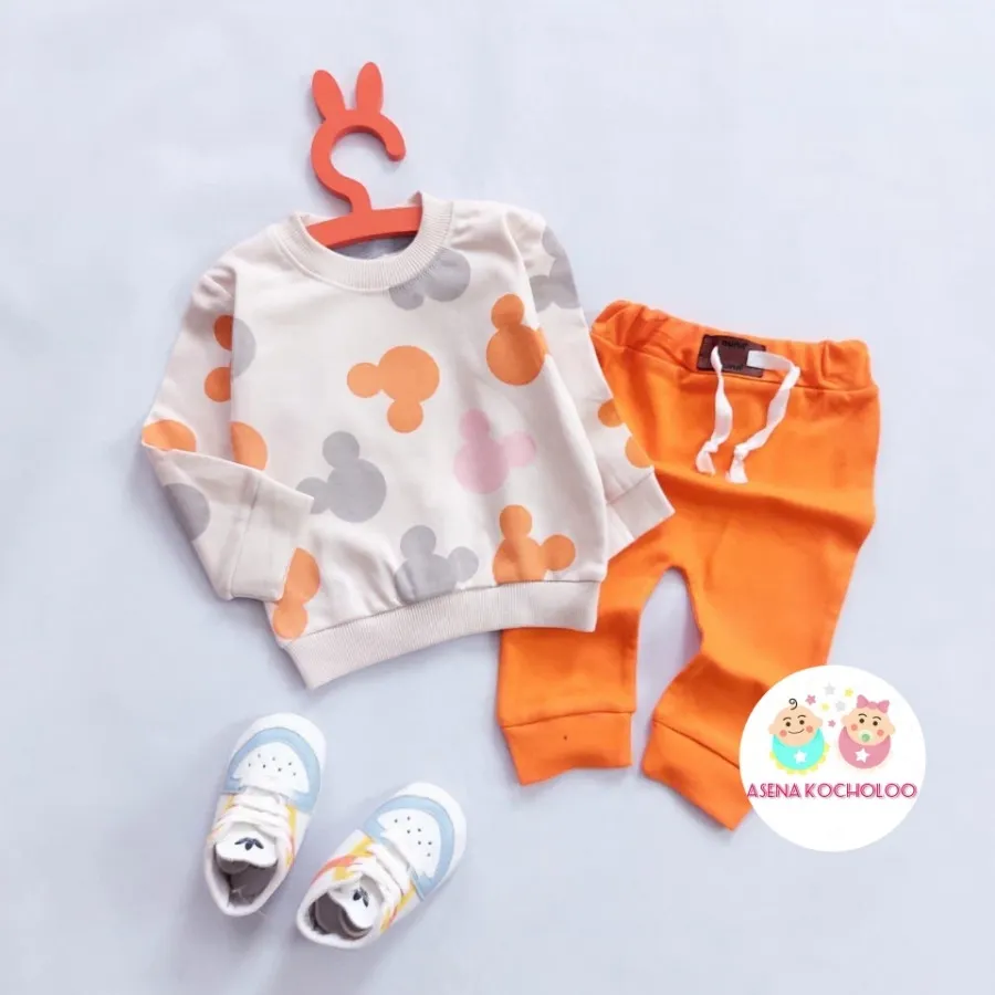 بلوز شلوار میکی نارنجی
✂