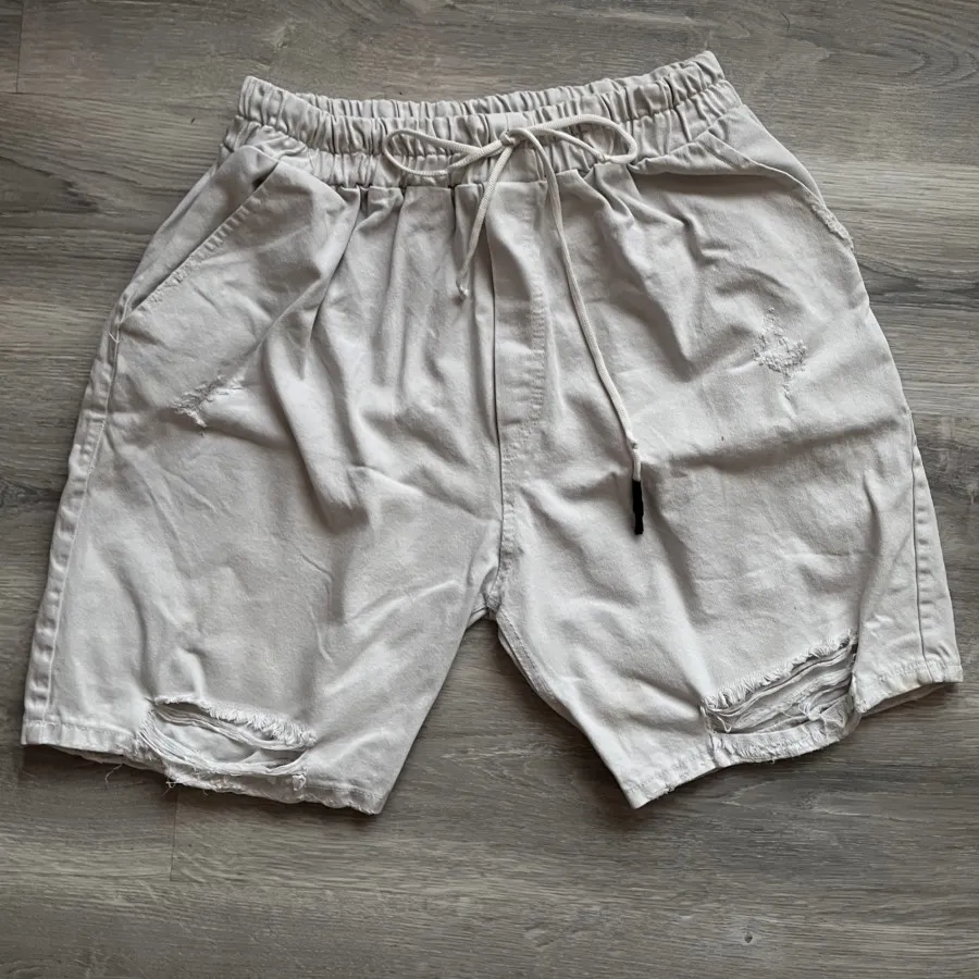 شلوارک گرم بالا سفید زاپ‌