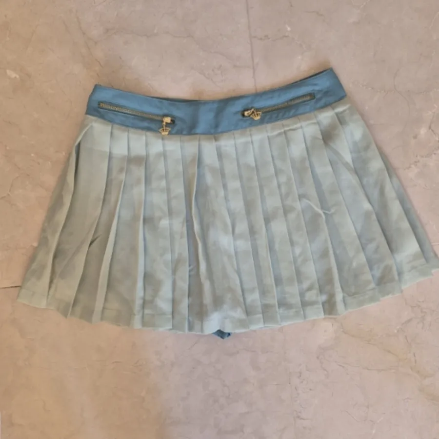 شلوارک طرح دامن پلیسه