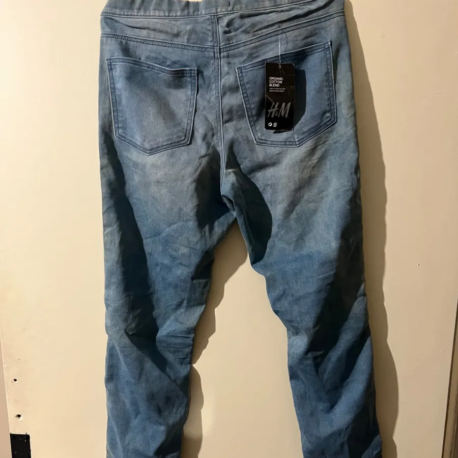 شلوار جین اچ ان ام