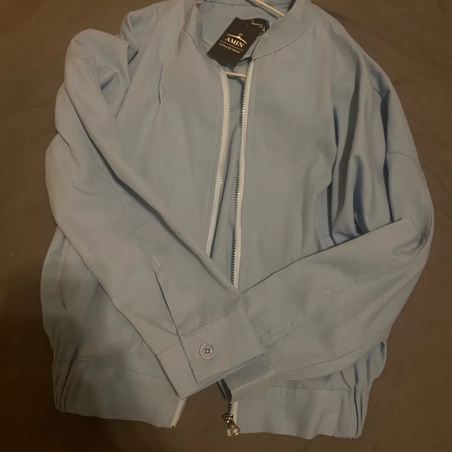 بامبر جکت آبی پاستیلی