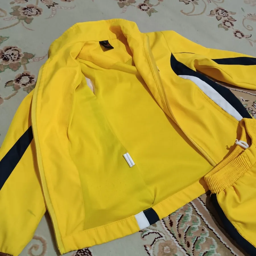 گرمکن و شلوار ورزشی