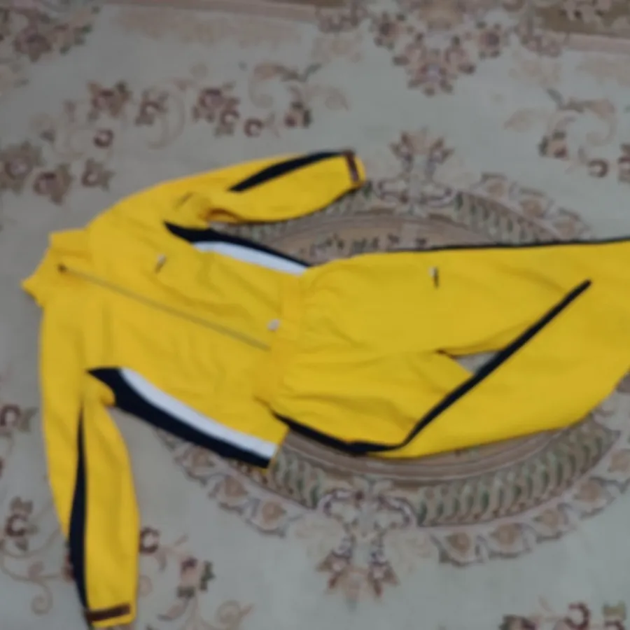 گرمکن و شلوار ورزشی