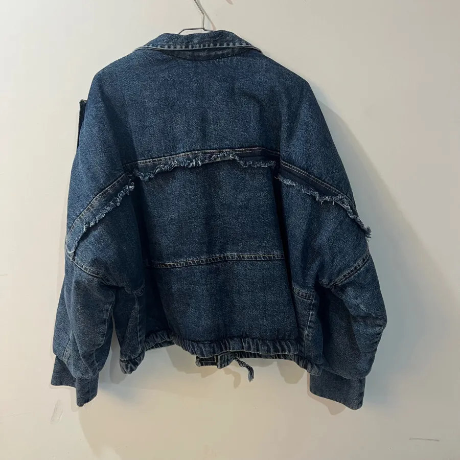 کاپشن جین توکرکی